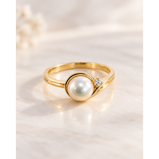 Bague en or jaune 10 kt avec perle d’eau douce et cz