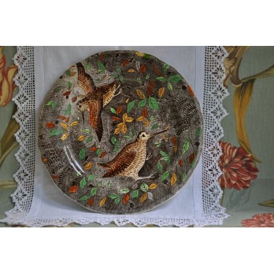 Assiette en faïence de Gien à décor d'oiseaux