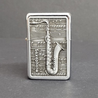 Briquet Saxophone, emblème en métal brossé...