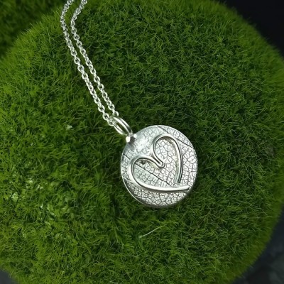 Pendentif Coeur d'enfant en argent