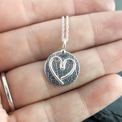 Pendentif Coeur d'enfant en argent