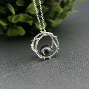 Pendentif Circus avec perle noire