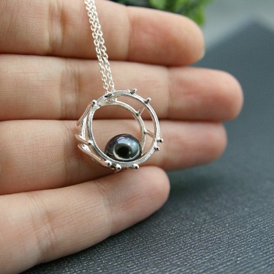 Pendentif Circus avec perle noire