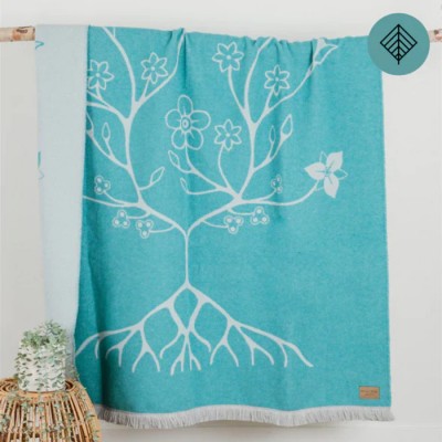 Couverture tout-aller fleurs autochtones aqua
