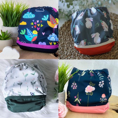 Surprise Lot de 20 couches FILLE - Couche à poche modèle - Prête à partir