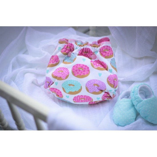 Couche moulée beigne rose