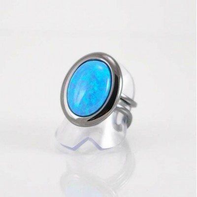 Bague fini gunmetal avec imitation opale bleu...