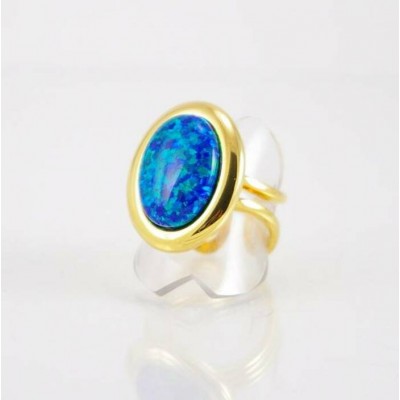 Bague fini or avec imitation opale bleu foncée