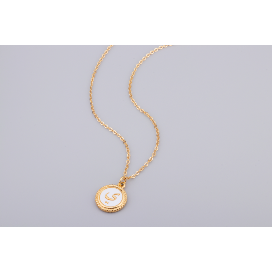 Pendentif doré avec insertion d'un médaillon en... Pendentif doré avec insertion d'un médaillon en...