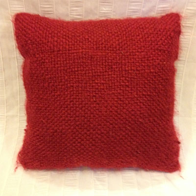 Coussin champêtre tricot rouge
