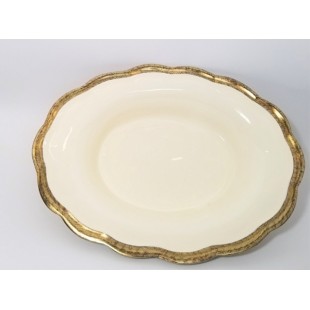 Plat de service doré ovale en porcelaine...