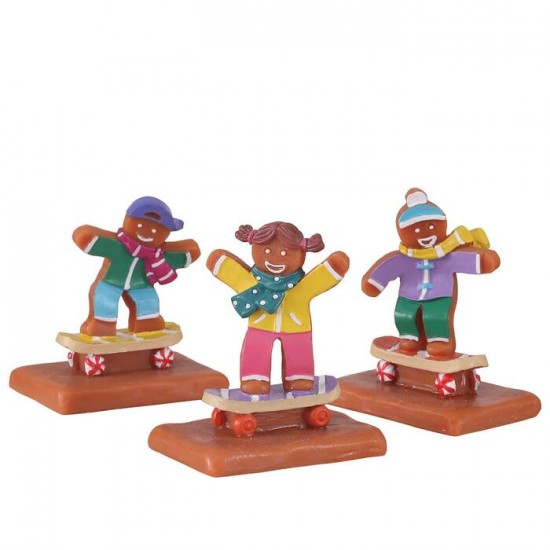 Figurines Enfants en pain d'épice sur planche à...