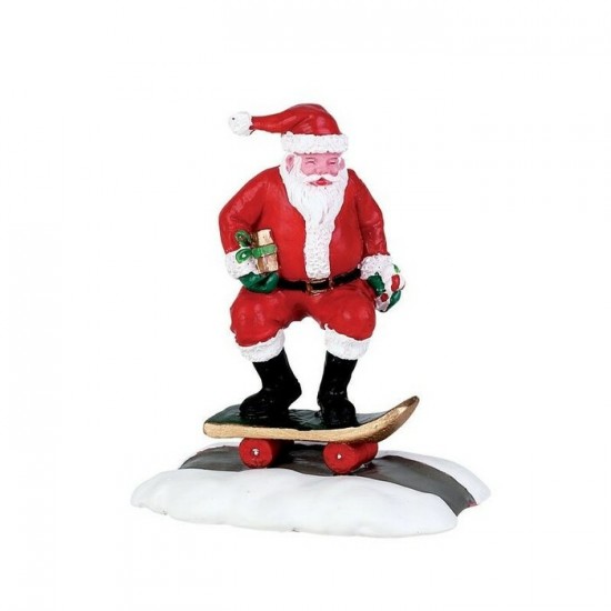 Figurines Père Noël sur planche à roulette #...